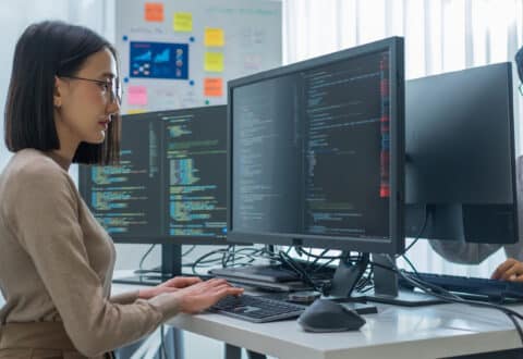 employees working on computers coding